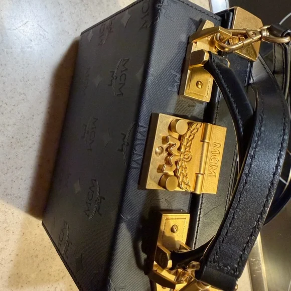 MCM Black Logo Trunk Crossbody with Gold Hardware - Picture 3 of 10